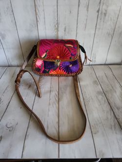 hand-embroidered, artisanal leather crossbody bag