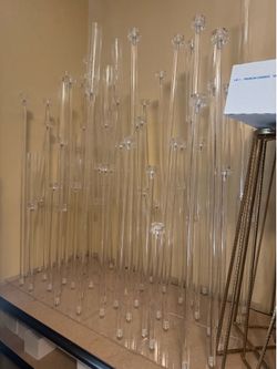 Set of 8 acrylic candelabra with hurricane sleeve.