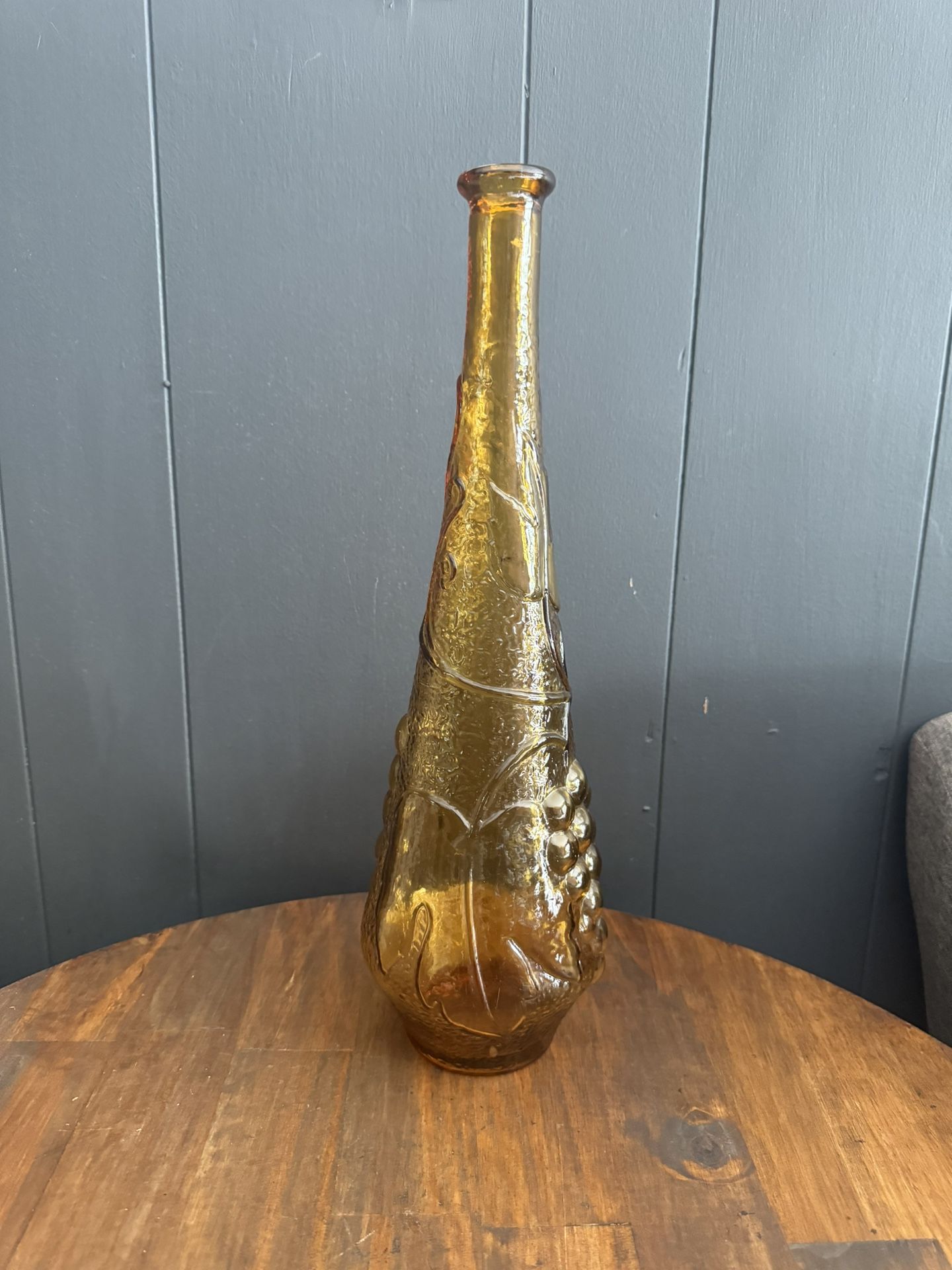 Antique Amber Glass Bottle with Embossed Floral and Grape Design - Vintage Decorative Vase