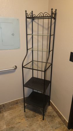 Metal and glass bakers rack.