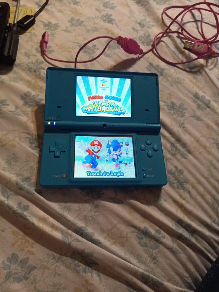 Nintendo DSi With One Game Mario And Sonic Winter Games