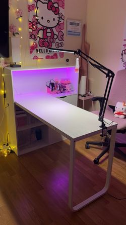 White Desk with drawers power strip and led lights.