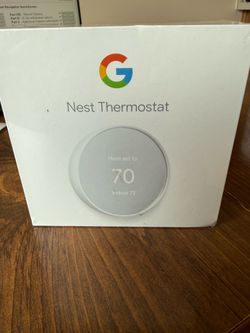 Google Nest Thermostat.  NEW
