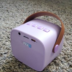 Mini purple karaoke machine.