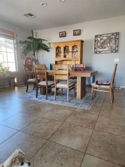 Wooden table chairs and bench