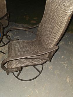 Patio table, chairs and firepit