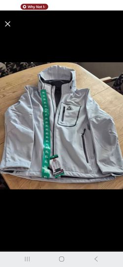 Gerry Weber Men's Light Gray Performance Jacket Light gray jacket with sleek design. Features zippered pockets and adjustable zip off hood. Ideal for 