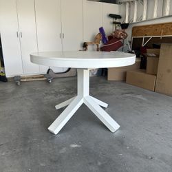 White Round Extendable Dining Table (Includes Leaf Extension)