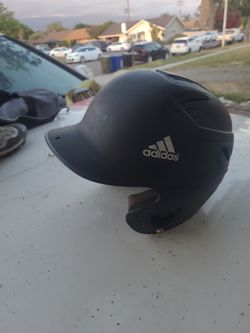Adidas baseball helmet and Nike batting gloves