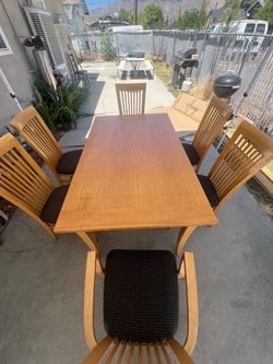 Solid wood dining table and chairs
