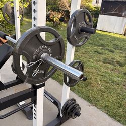 Fitness gear half rack with adjustable bench  and 300 pounds weights set including bar  and clips  everything is in like new condition pick up in sun 