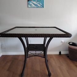 GLASS TOP WICKER TABLE