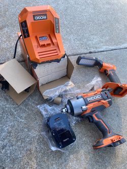 NEW ridgid 18v 1/2 inch impact, max output charger and handheld led