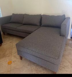 Beautiful grey sectional couch from Living Spaces
