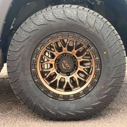 17x9 Combat Lock Off-road Wheels And Tires 285/70/17 RBP AT