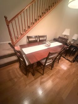 Solid Wood Dining Table with 10 Chairs.