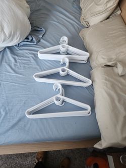 27 Heavy Duty Plastic White Hangers