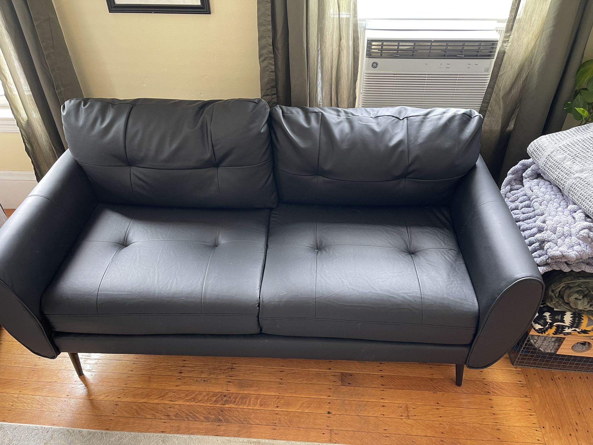 For Sale: New Black Faux Leather Loveseat
