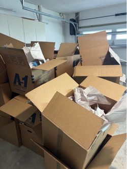 Dozens of high quality moving boxes! With wrapping paper!