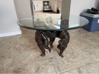 Glass coffee table/ Cherubs