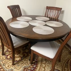 Round Dining Table And Chairs