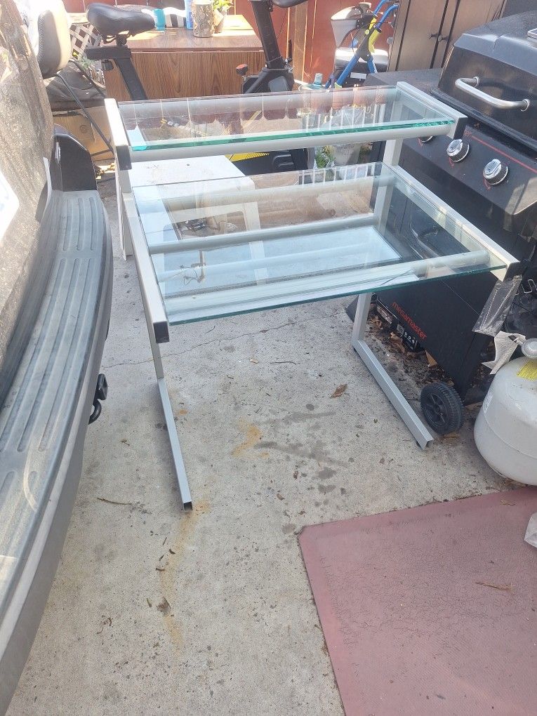 Table Glass Desk , Sturdy, Good As Is , FREE,Good Condition ,has Pieces Extra To Add Don't Kno If Complete .