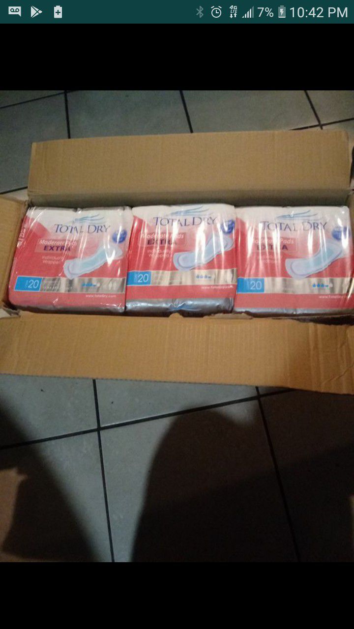 Boxes of womans pads big diapers and sheets to prevent matress from wet stains... You can mix and match each box at $15