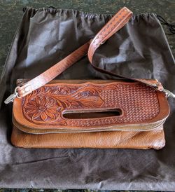 Artisan clutch leather bag