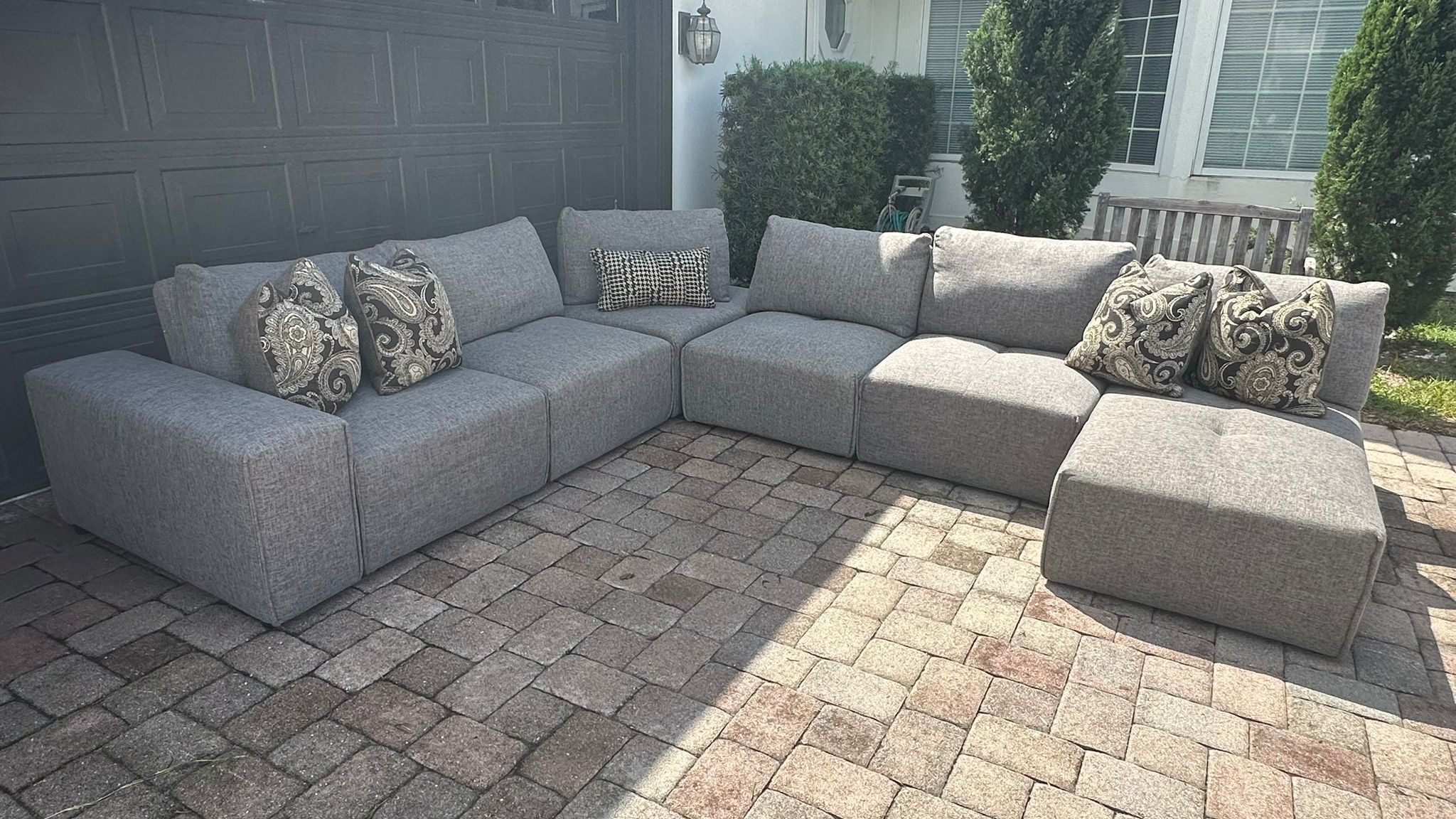 I would like to buy your Sectional/Modular Sofa Rooms to go Laney Park Beige/Gray 6 Pieces DELIVERY AVAILABLE