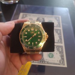 This Is An Invicta Men's Pro Diver 43mm Gold Plated Watch With Green Dial