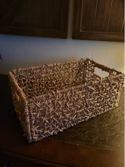 rectangular wicker storage basket w/ an open-weave seagrass