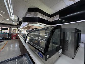 vitrina refrigerada curva de sobremostrador Atosa