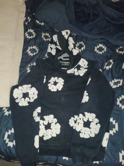 Denim Tears. dark blue and white
