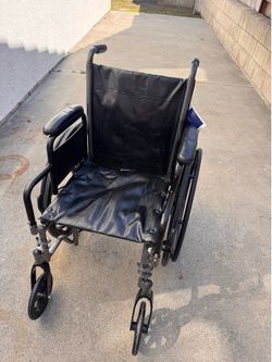 Wheel chair barely used. Practically brand new