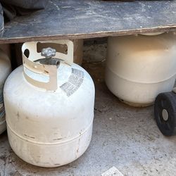 Five Empty Propane Tank Bottles Available For Purchased