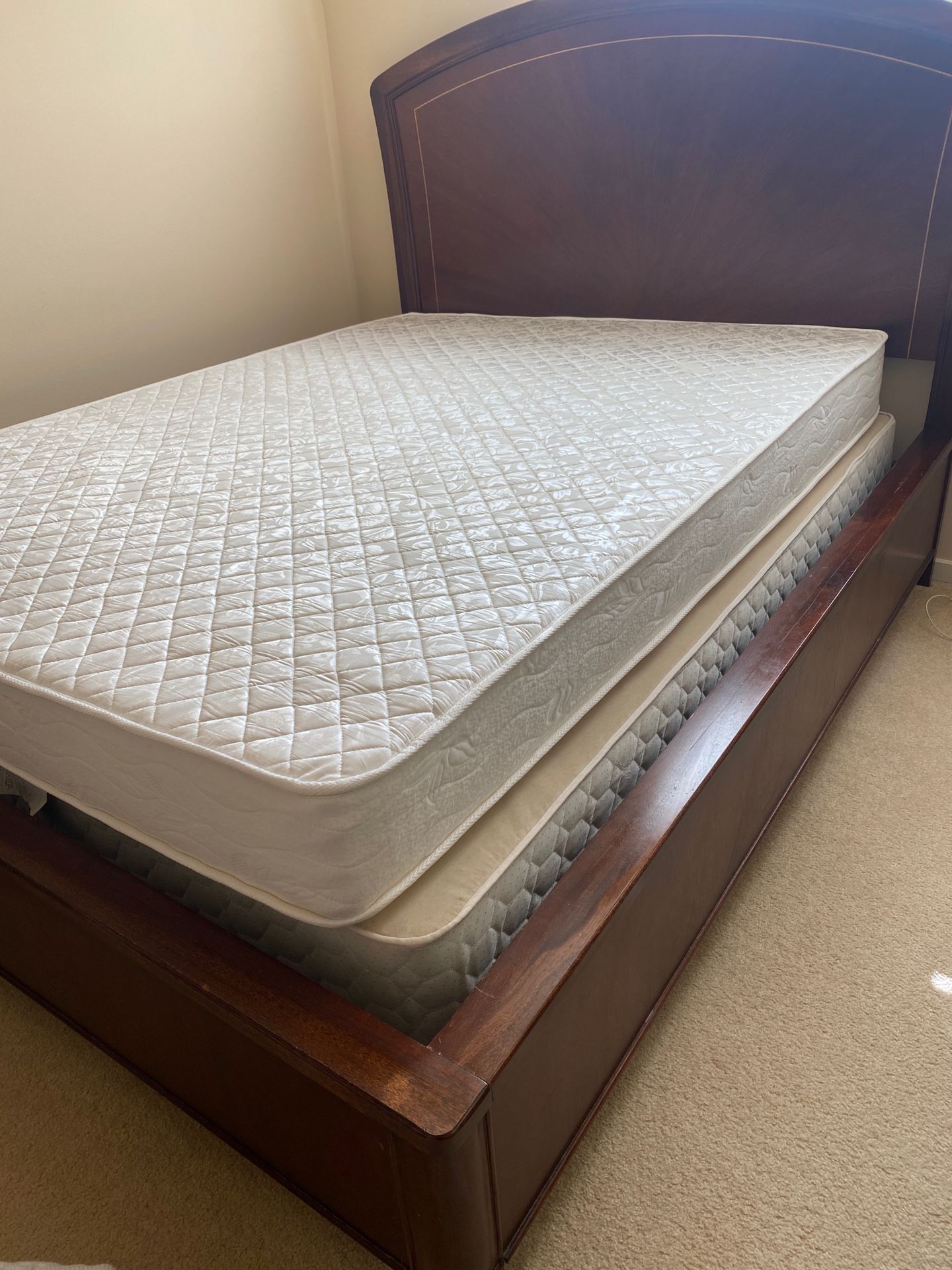 Queen mattress and box spring. Used in spare bedroom. Popsicle stain