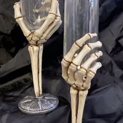 Skeleton hand, wine glasses