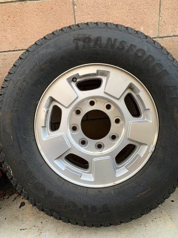 New Wheels and tires. 8 lug wheels from a Chevy Silverado and firestone