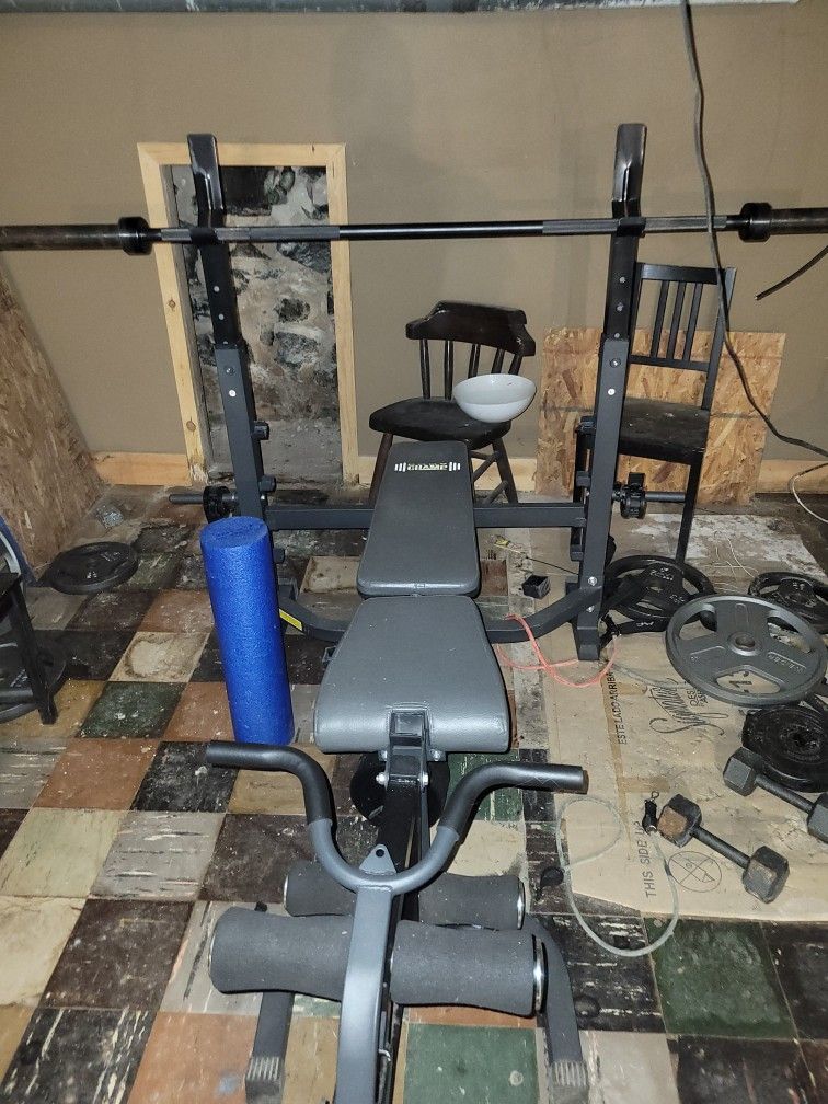 Olympic Bench Olympic Barbell 205 In Weights 15 Pd Dumbells And 35 Pd Dumbell And Foam Roller. And Resistance Bands