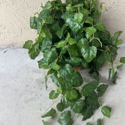 basket with artificial plant