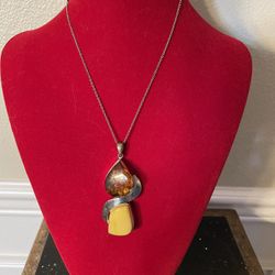 Vintage Sterling Silver Butterscotch Amber Pendant (chain not silver )
