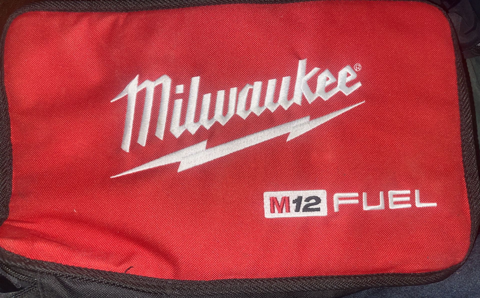 Milwaukee M12 Fuel Bag With Two Brand New Batteries N Charger