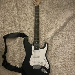Electric Guitar + 1/4” Cable (Works Great) 