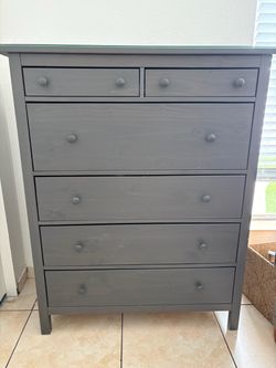 IKEA dresser with glass top.