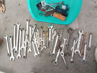 Bundle of tools and stuff - crescent wrenches, saws, hose, magnifier & more