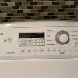 LG 4.5 cu. ft. Ultra Large Washer & 7.3 cu. ft. Ultra Large Capacity Gas Dryer