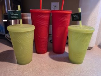 Starbucks glow in the dark and 2 red Studded