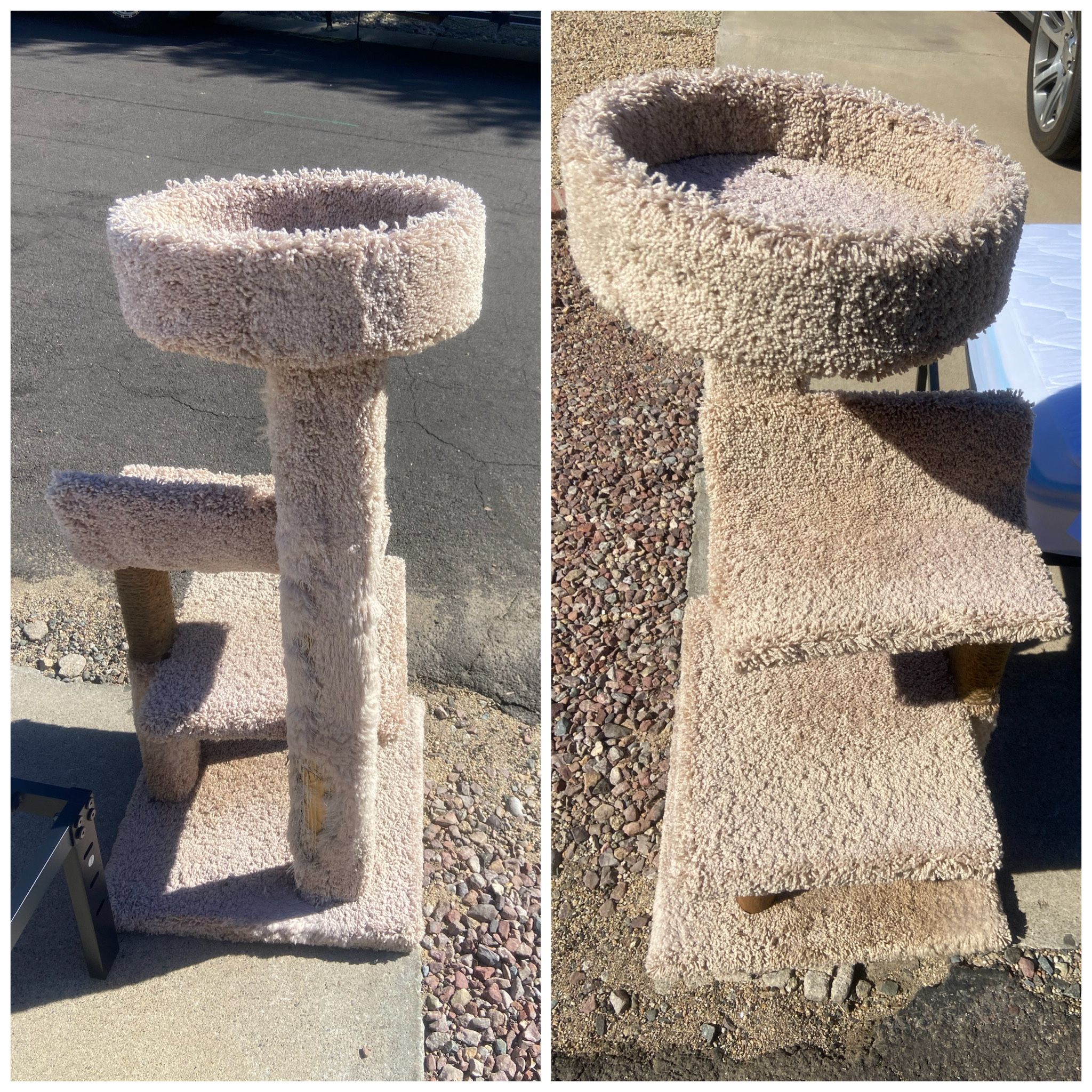 large cat condo. Used condition but lots of life left in it! Bought 2023. Approx 4 feet tall