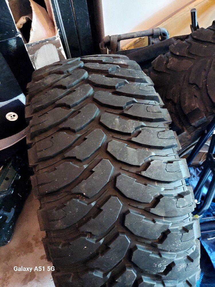 4 Mud Tires On 18 In. Ultra Motorsport Rims