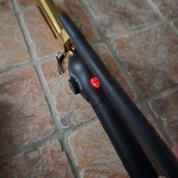 Express Gold Curl Marcel Titanium Curling Iron
And Brush